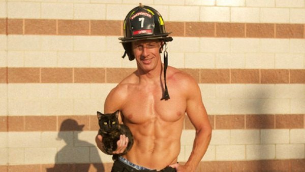 Firefighter And Kitten