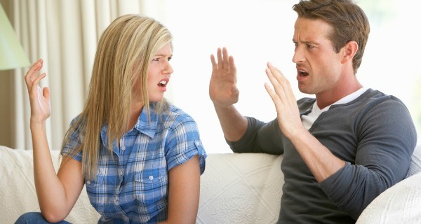 Young Couple Having Argument At Home