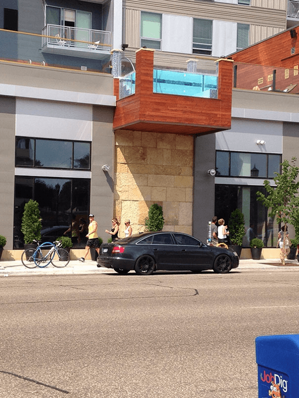 Pool Above A Sidewalk