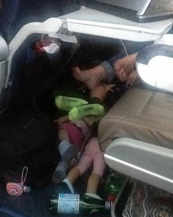 Kid Sleeping On Dolls